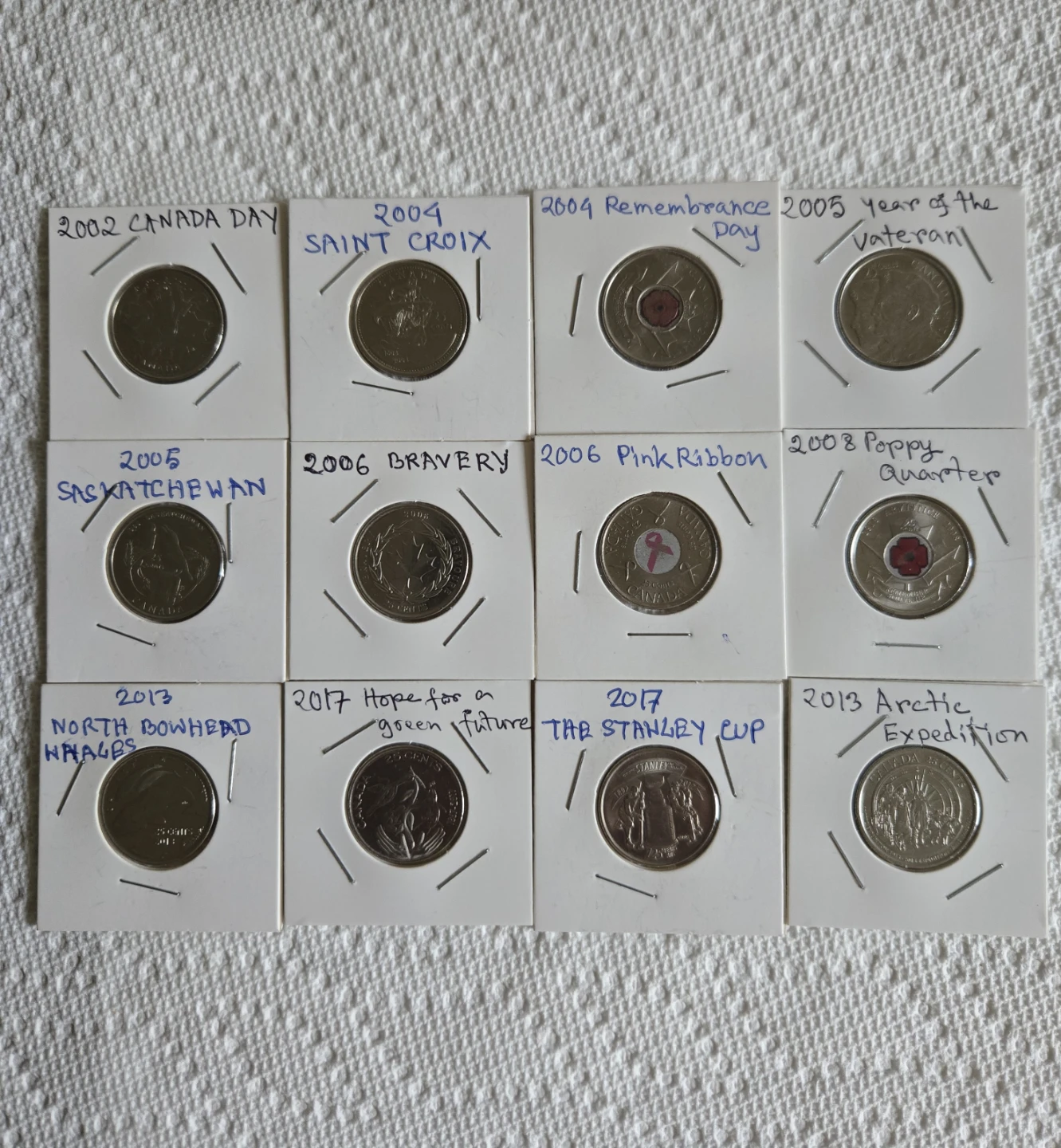 Collection of 12  Canadian Quarters