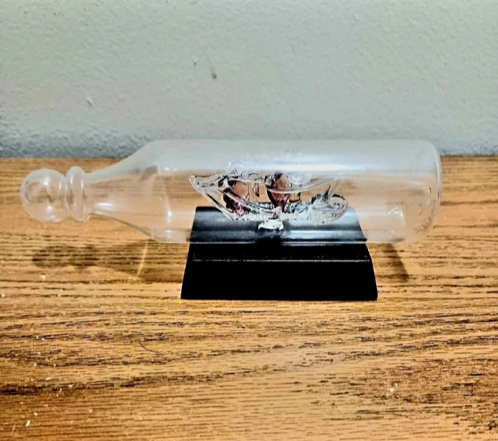Mouth-blown Cranberry Glass Sailship Inside a Bottle