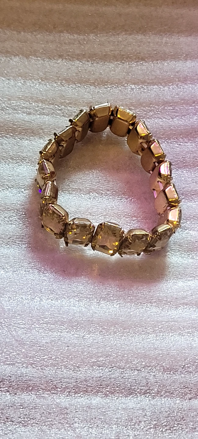 Gold-tone Stretch Bracelet with Clear Baguette Stones
