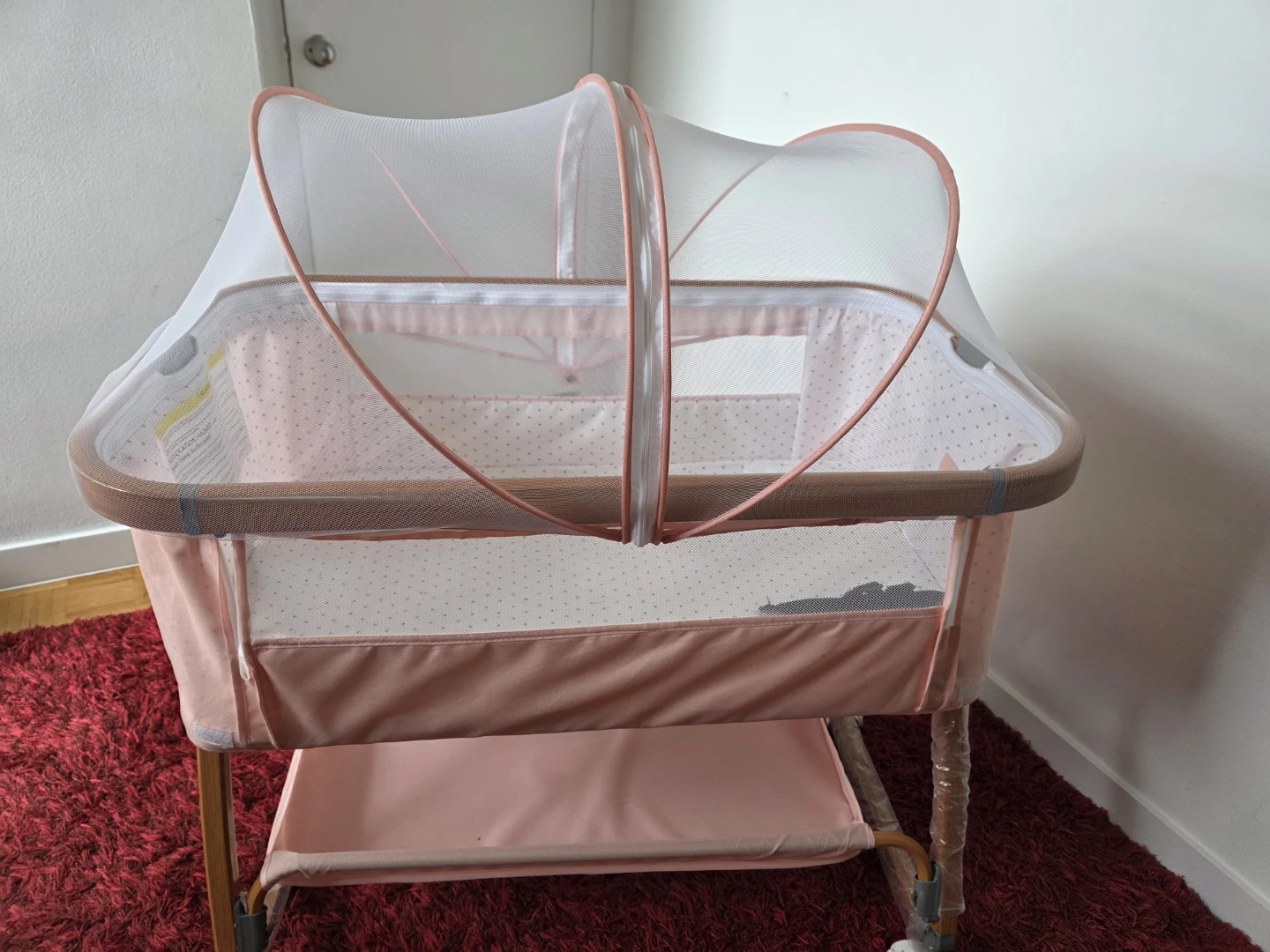 Pink Bassinet with Mosquito Net