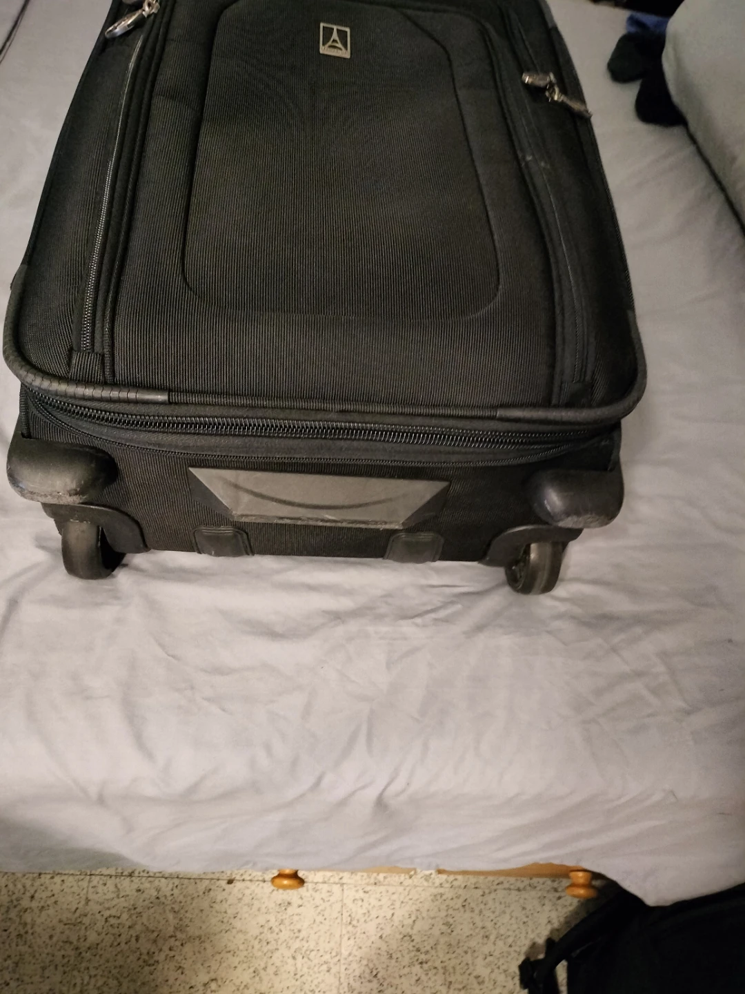 Travelpro Black Rolling Suitcase - photo 2