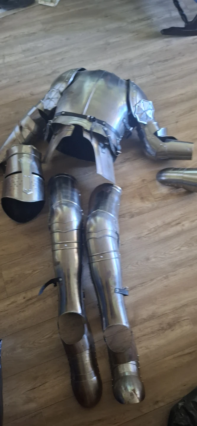 medieval knight plate armor set with Crusader Great Helm.
