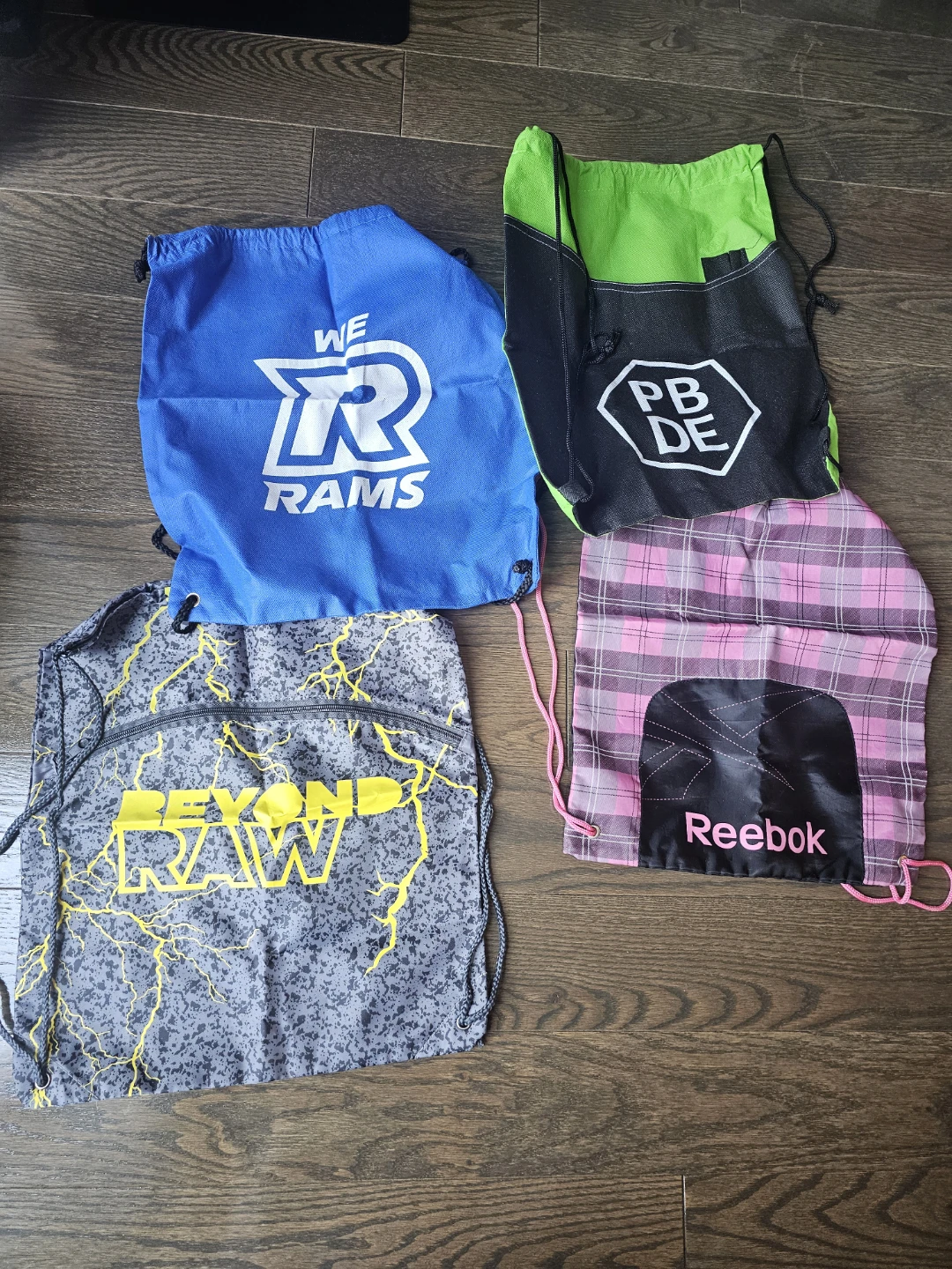 4 Drawstring Bags - Reebok, Rams, PBDE, Beyond Raw