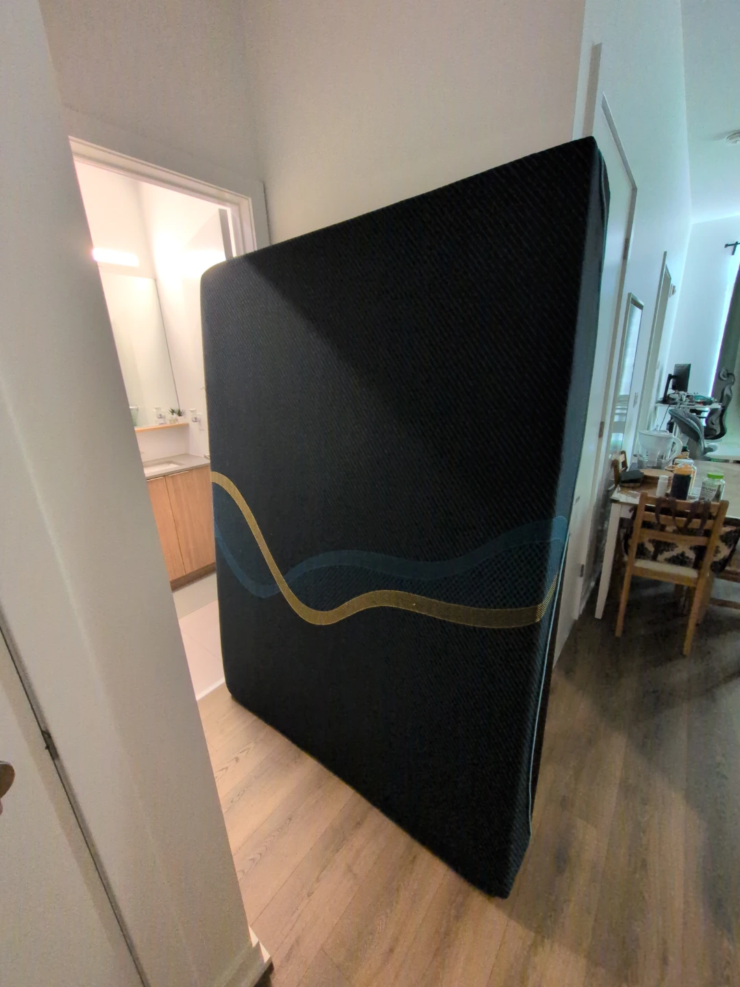 Full Size Black Mattress with Blue and Gold Wave Design