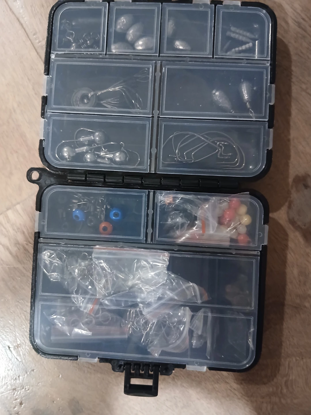 Fishing tackle box with assorted accessories