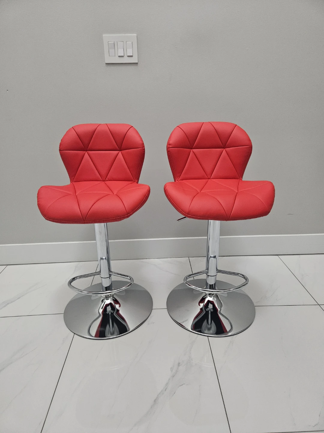 Pair of Red Adjustable Bar Stools