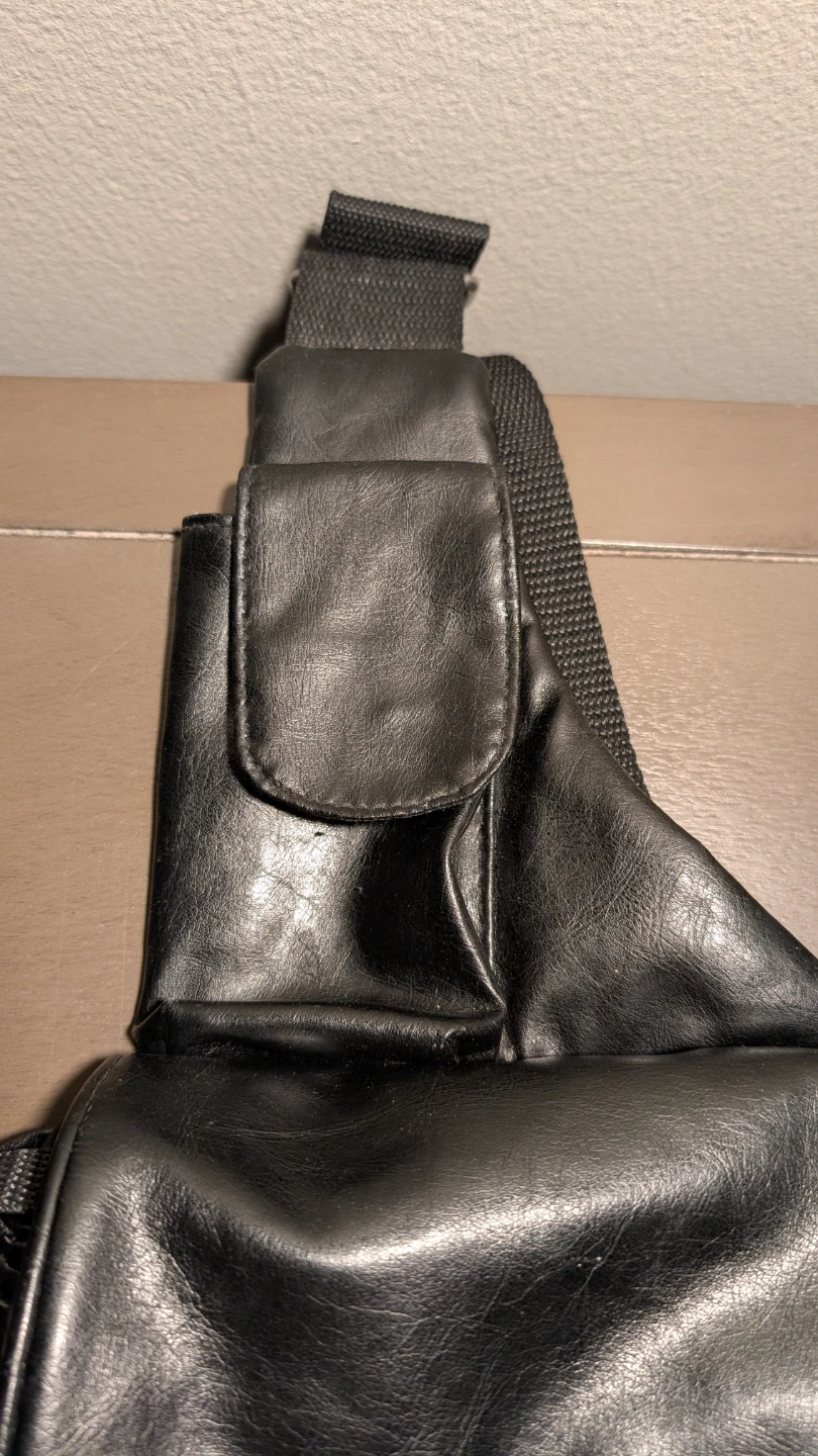 Roots Black Faux Leather Sling Bag - photo 2