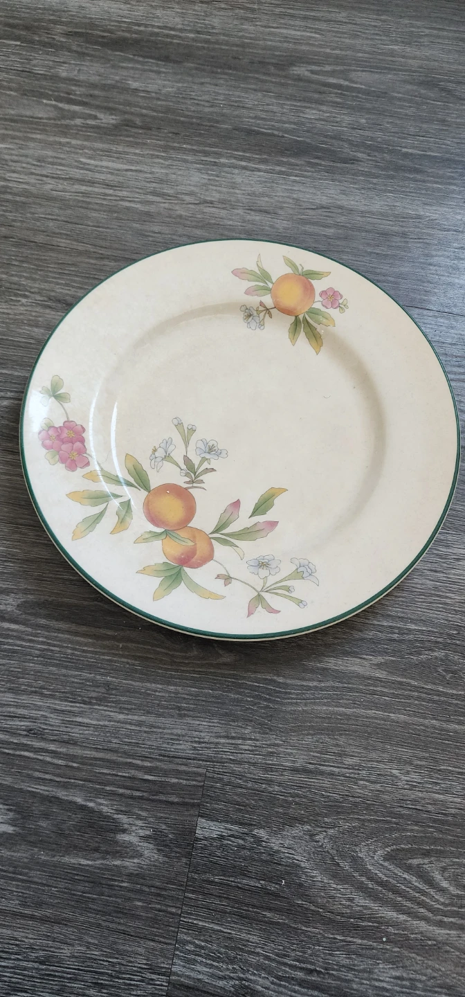 Decorative plate with peach and floral design