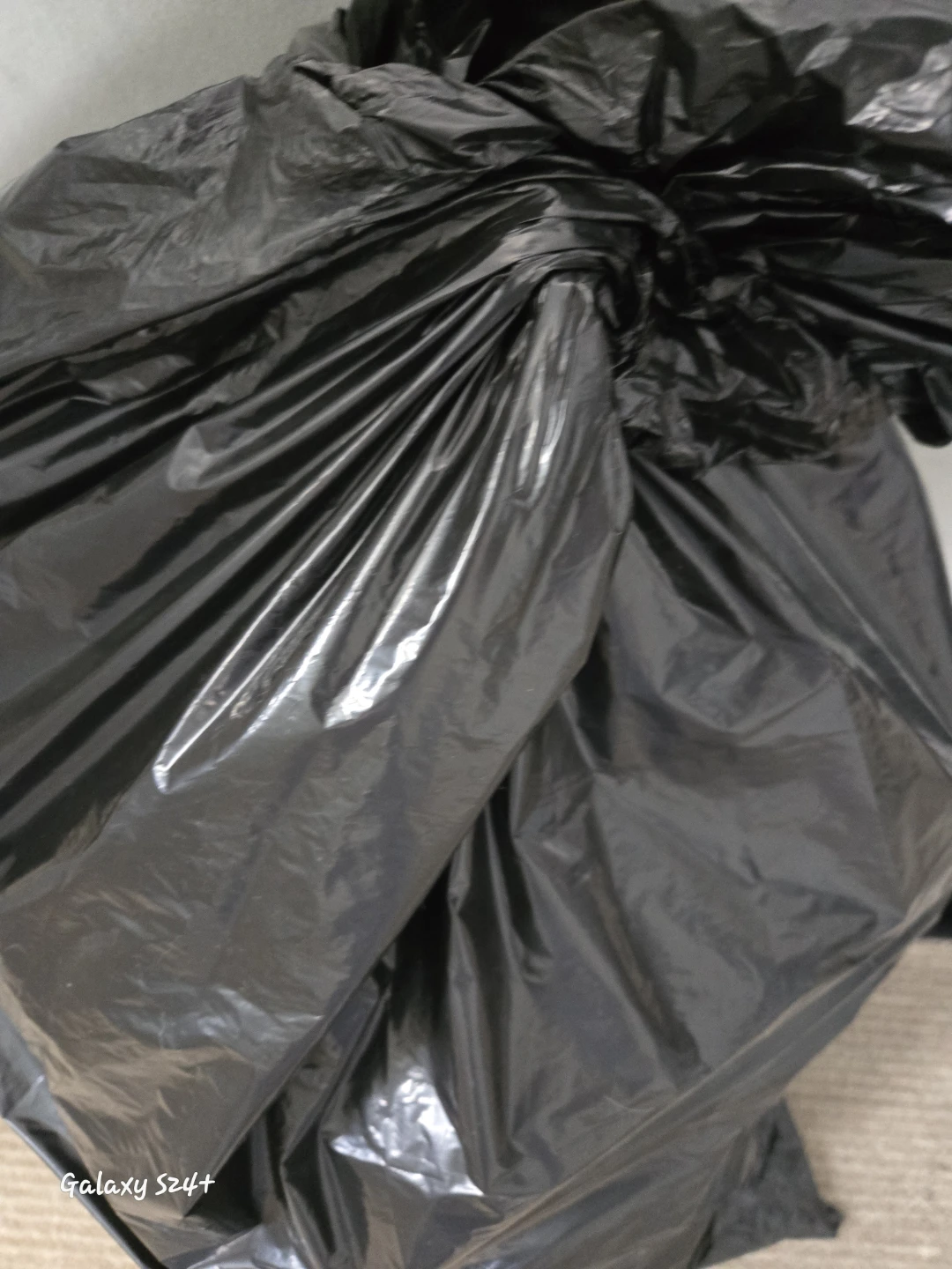 Mystery bag of teenage boy clothes.