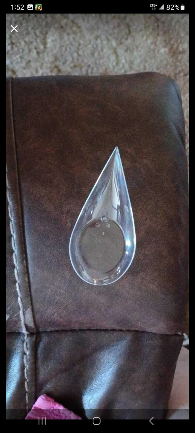 Clear teardrop-shaped serving spoon