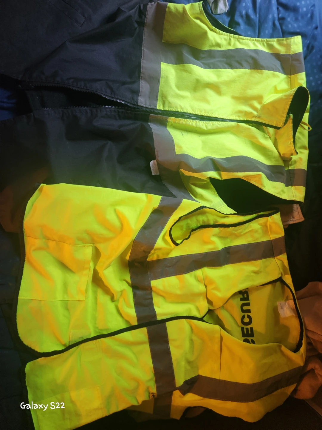 Two high-visibility safety vests.