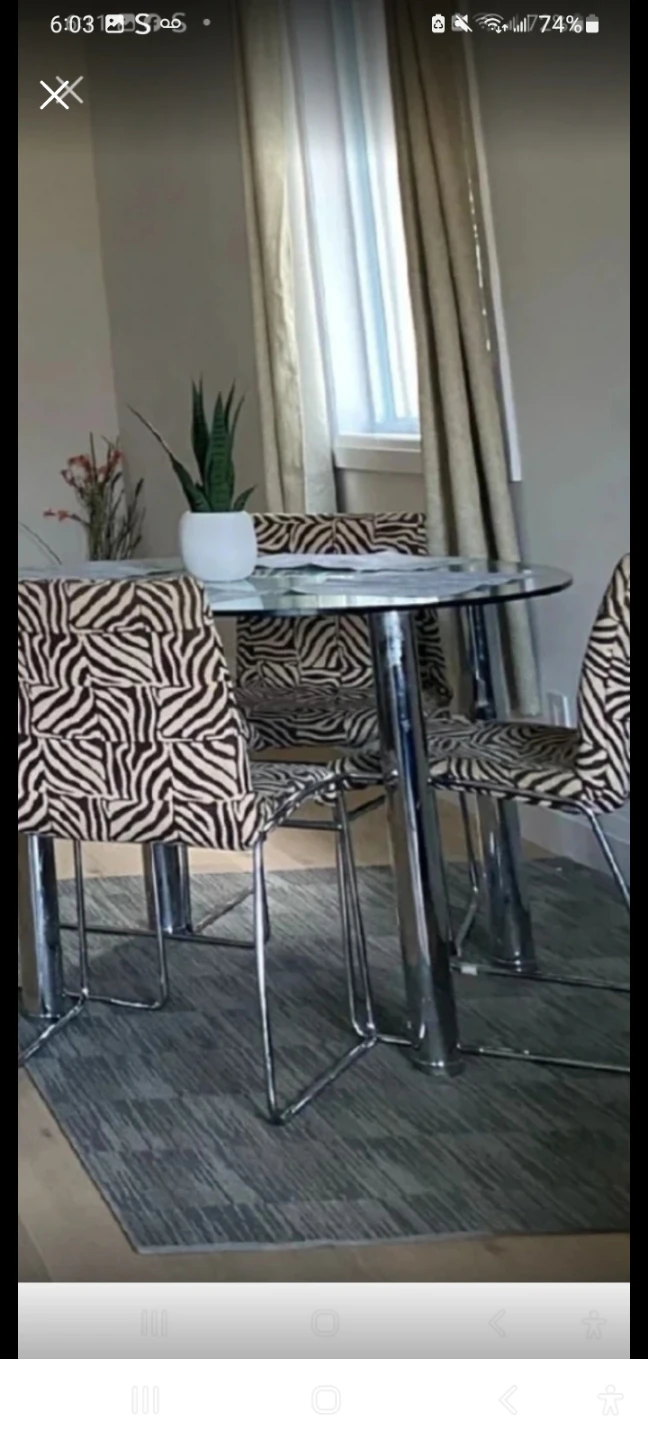 Glass Dining Table Set with Zebra Print Chairs