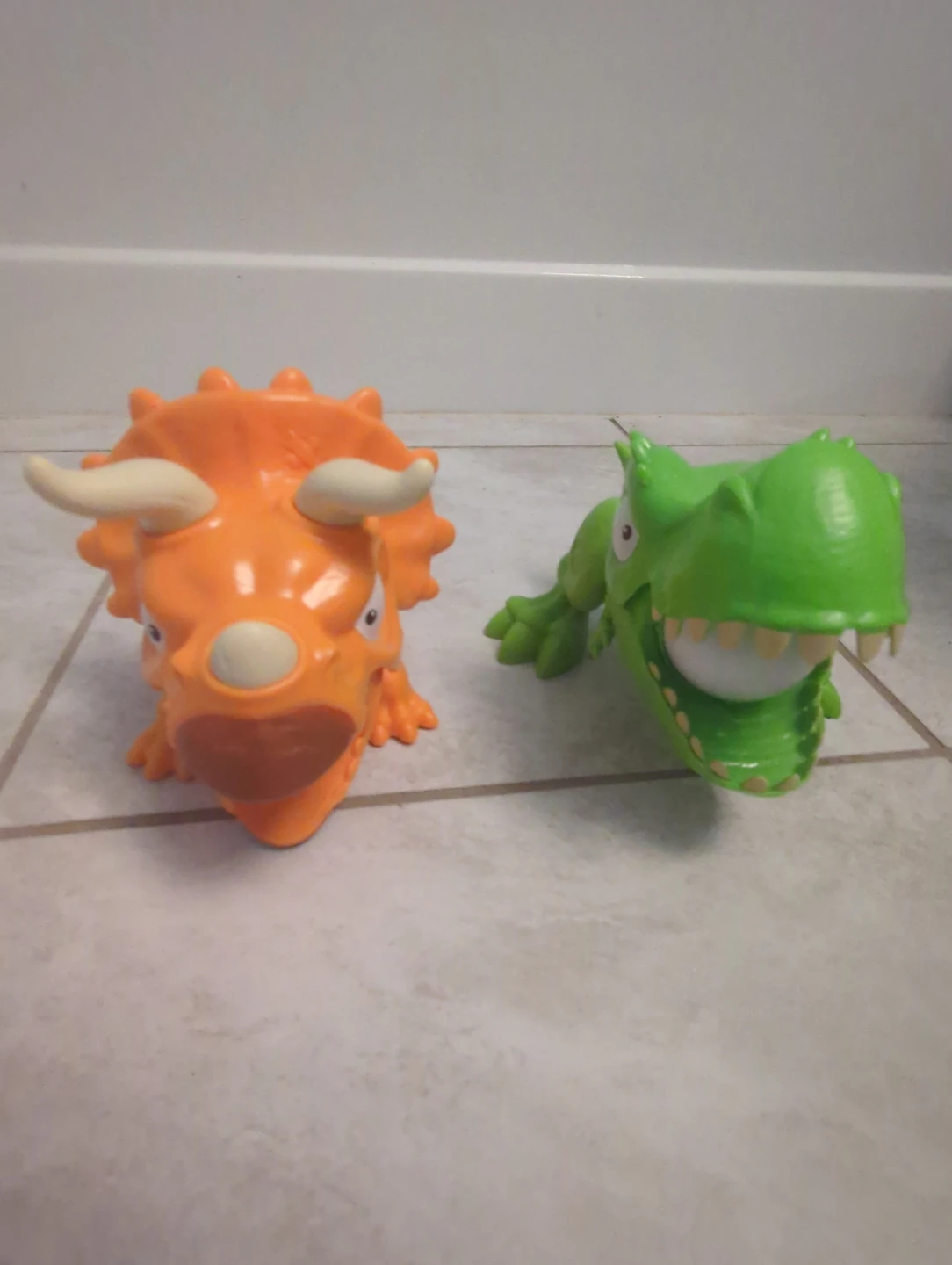 Orange Triceratops and Green T-rex
