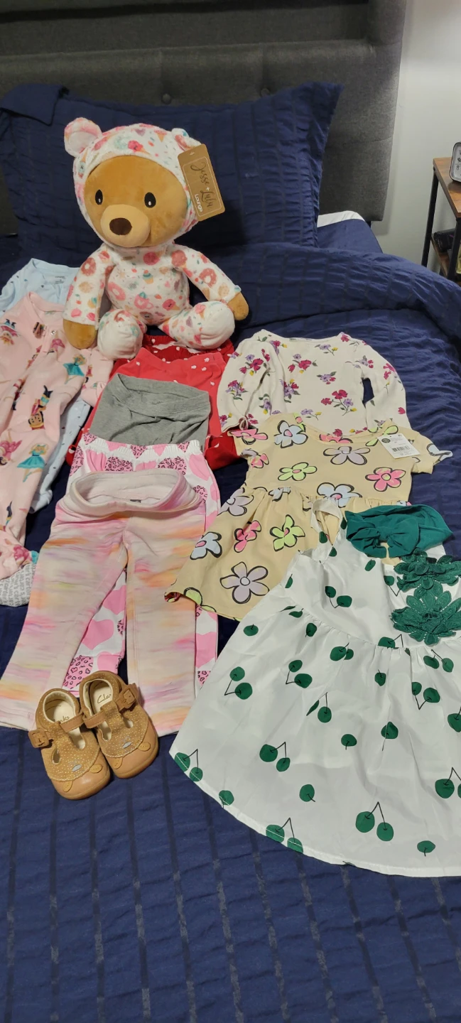 Baby and toddler clothing bundle with plush bear