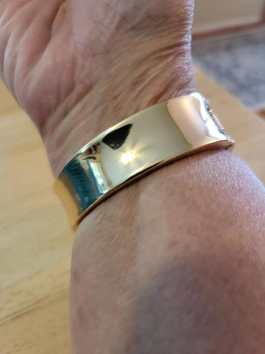 Gold tone cuff bracelet with black stone accent - photo 4