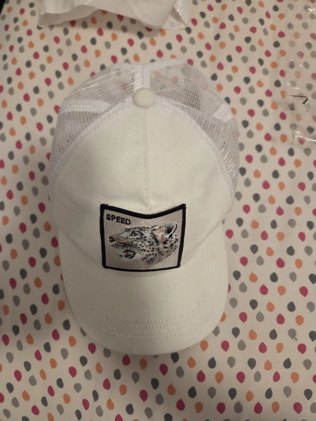 White Trucker Hat with Speed Wolf Patch