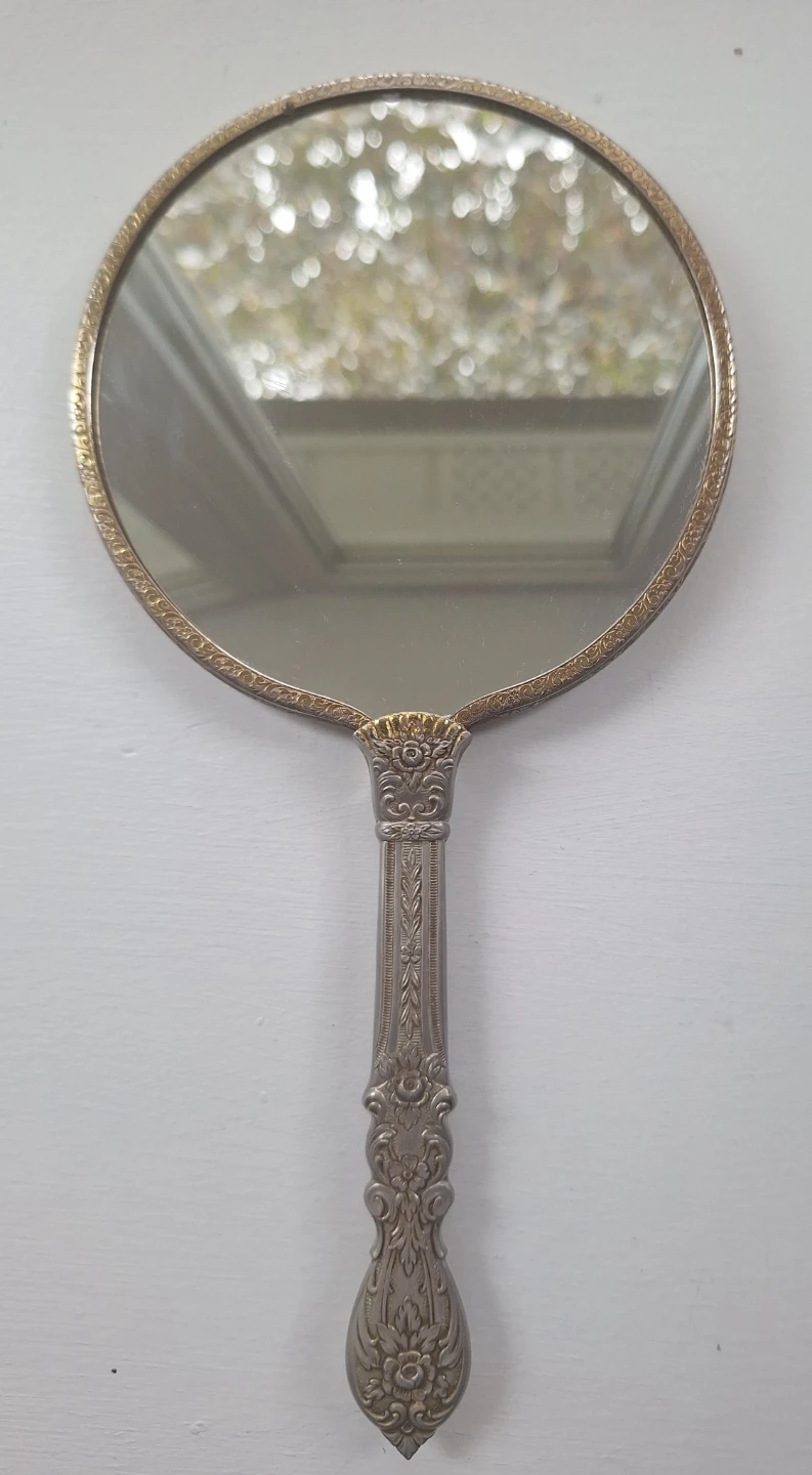 vintage, silver-plated double-sided handheld mirror