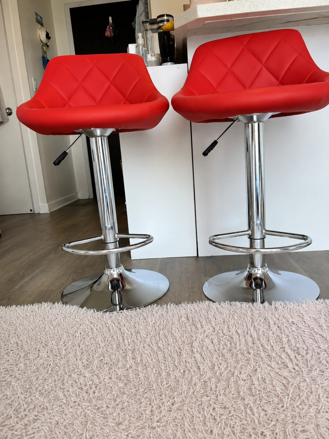 Pair of Red Adjustable Bar Stools