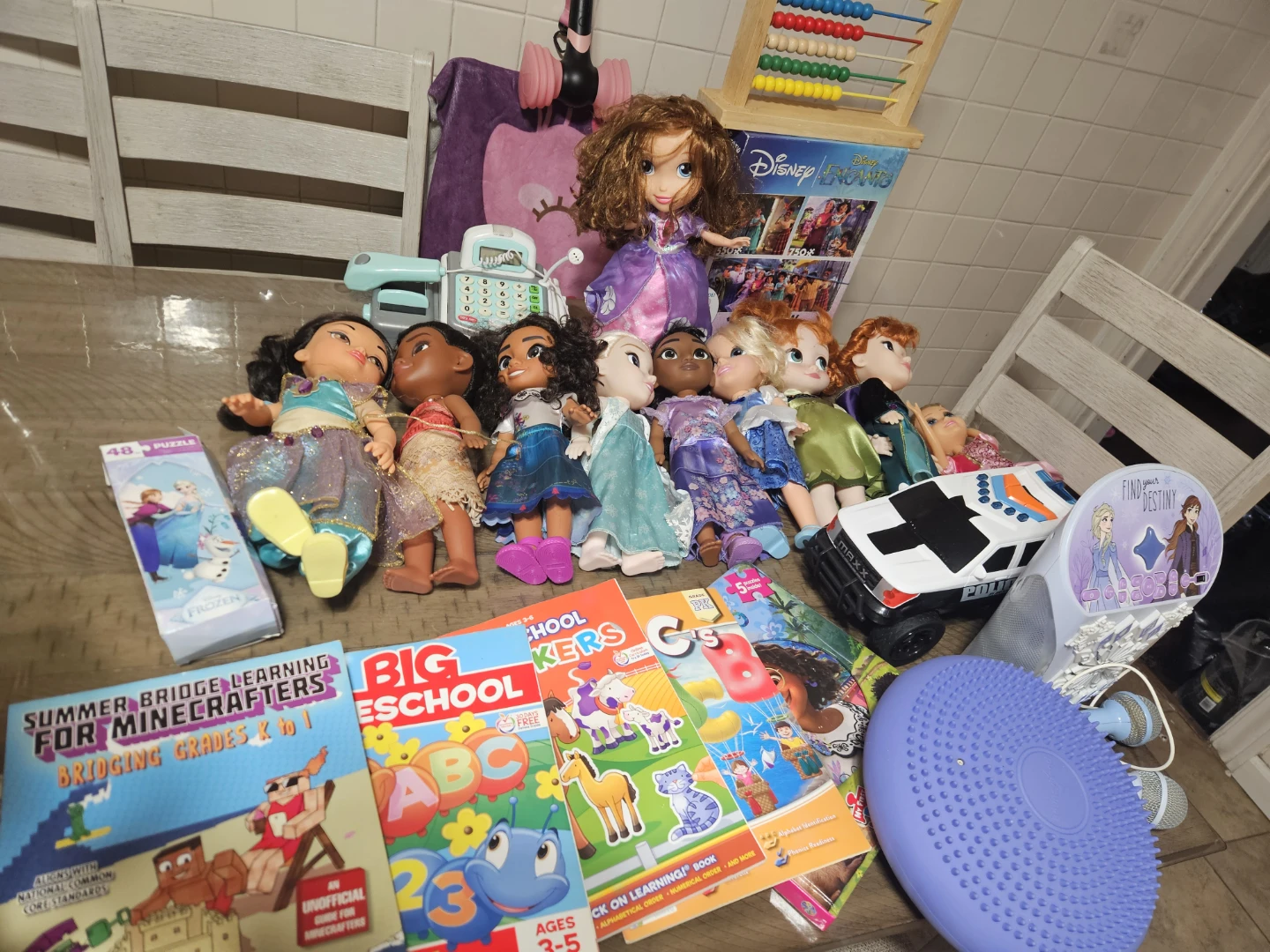 Assorted Disney Princess and other character dolls and toys