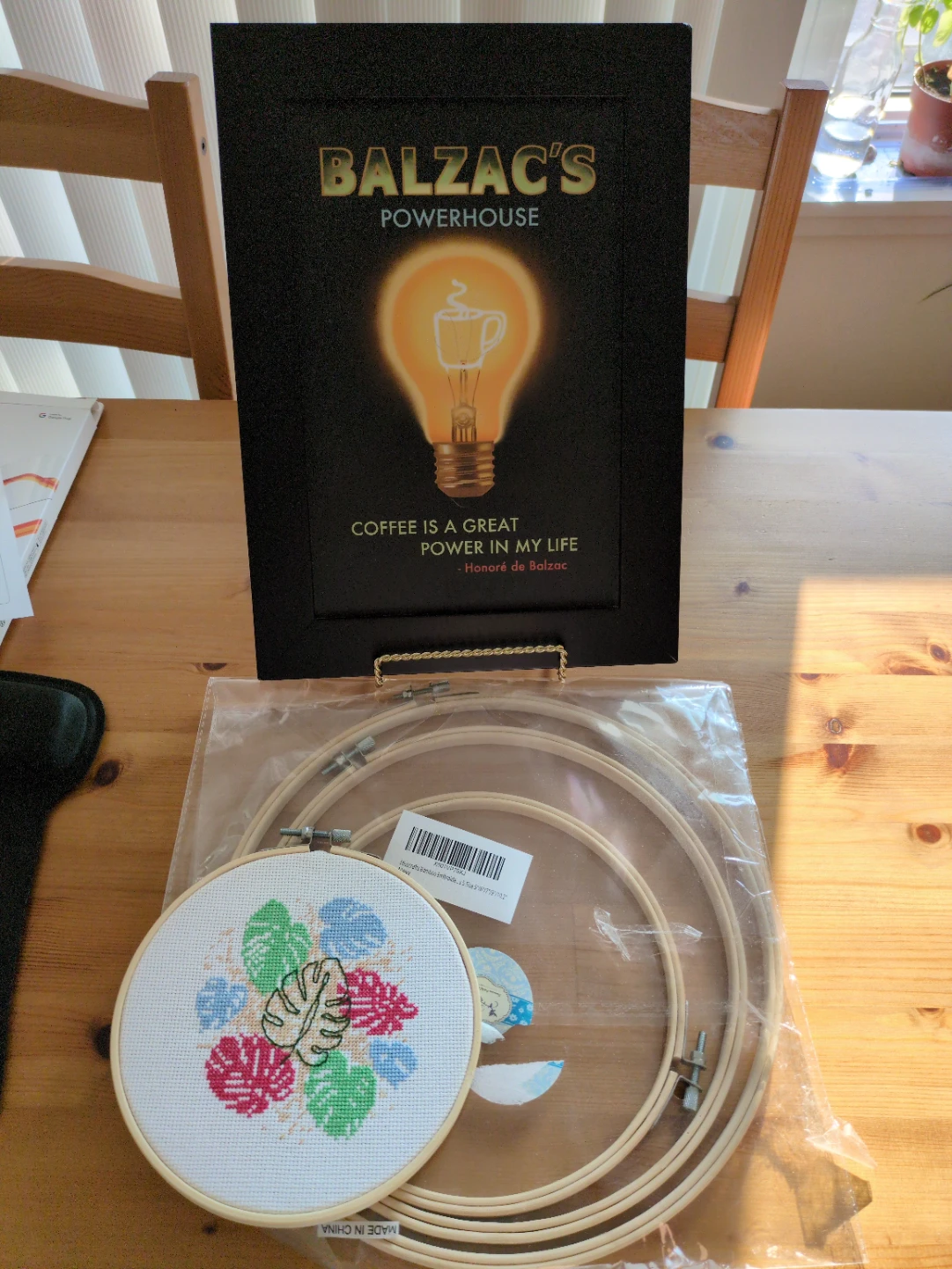Framed art, cross-stitch embroidery and embroidery hoops