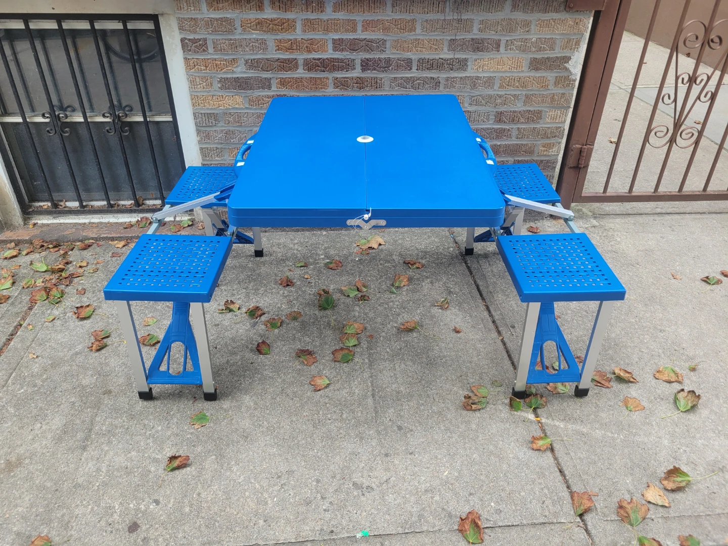 Blue Folding Picnic Table with 4 seats chairs and umbrella hold