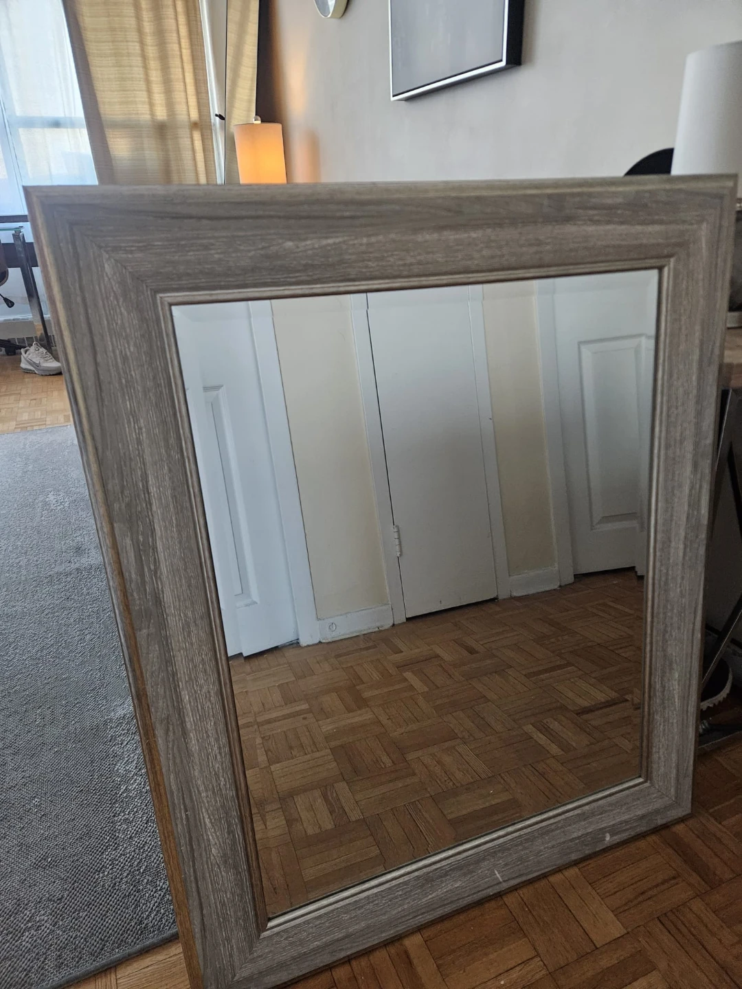 Large wood framed rectangular mirror
