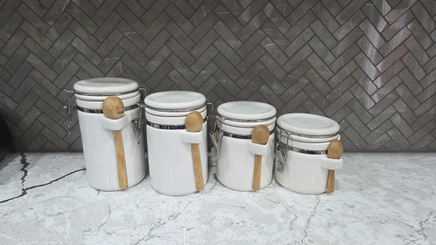Set of 4 White Ceramic Canisters with Spoons