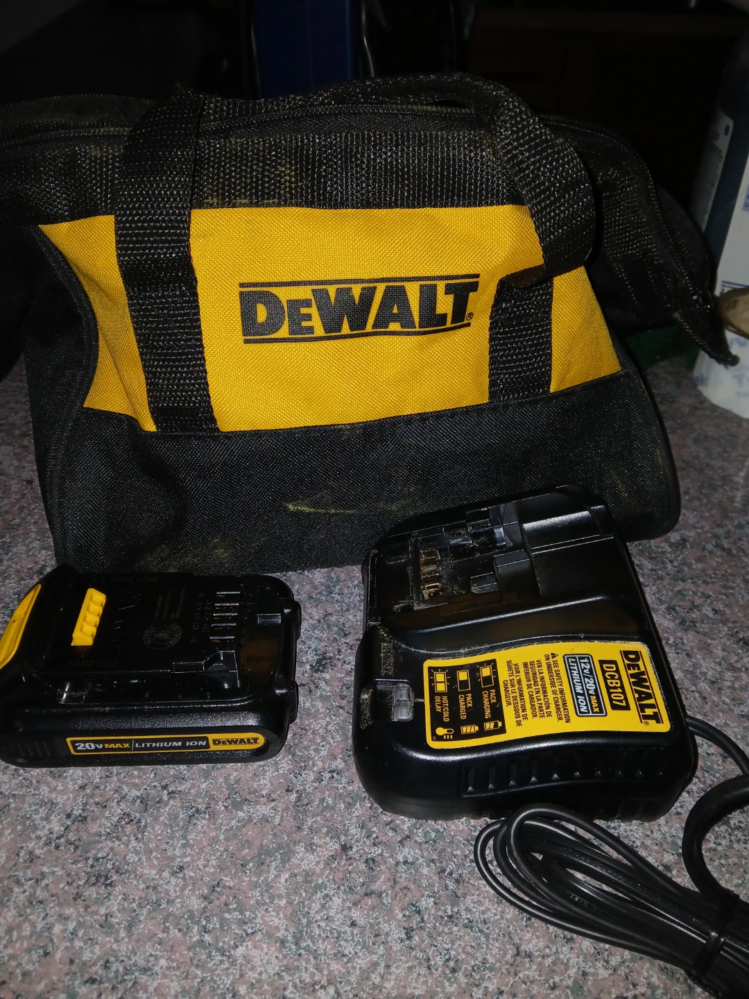 20 volt batery charger and a bag new
