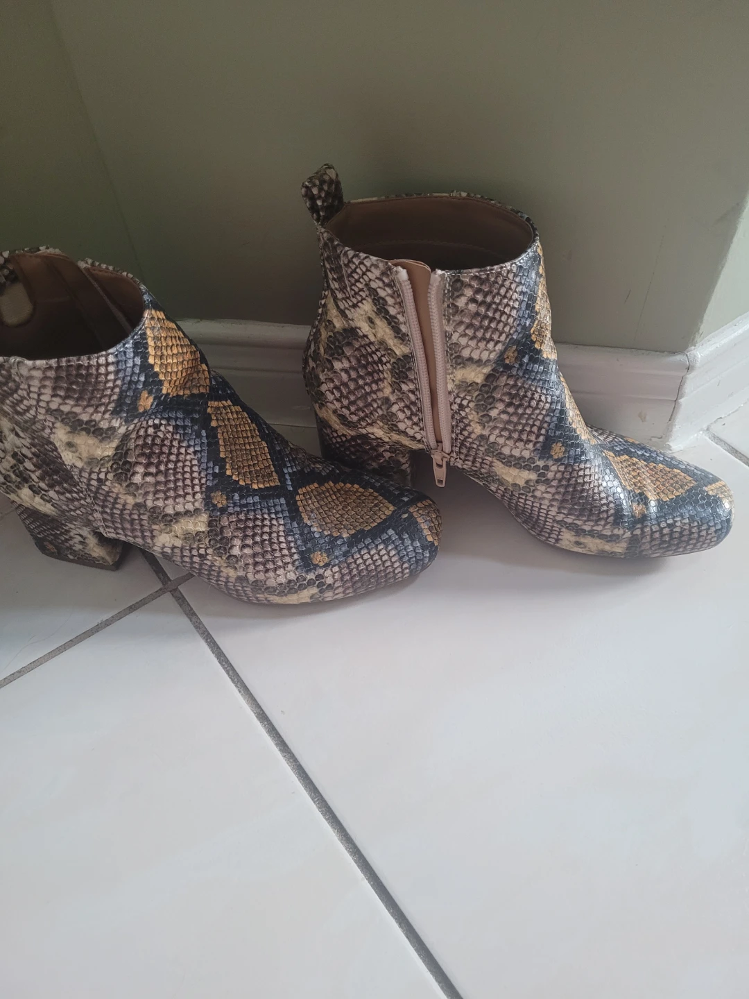 Snake print ankle boots