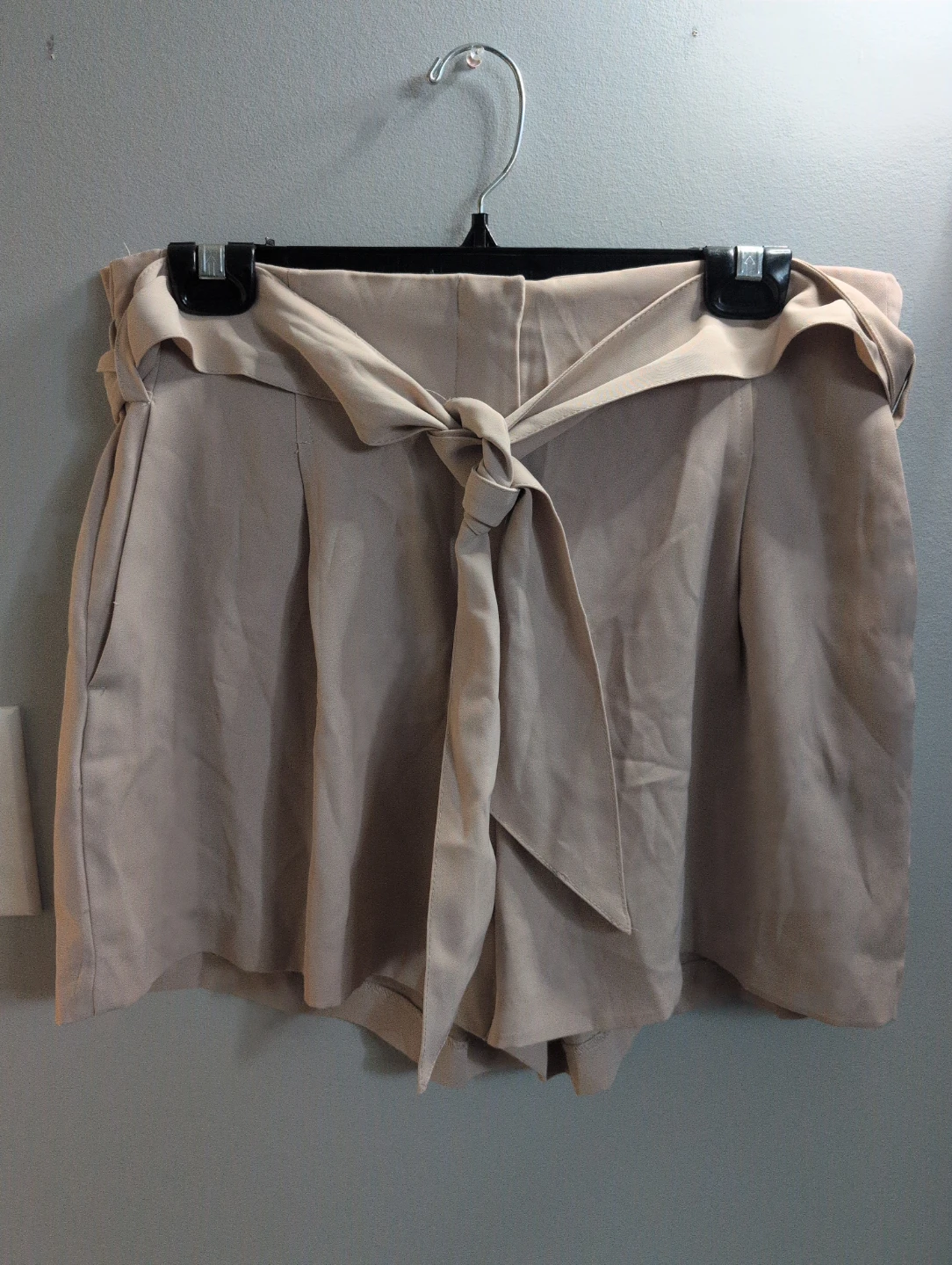Beige high waisted shorts with tie belt