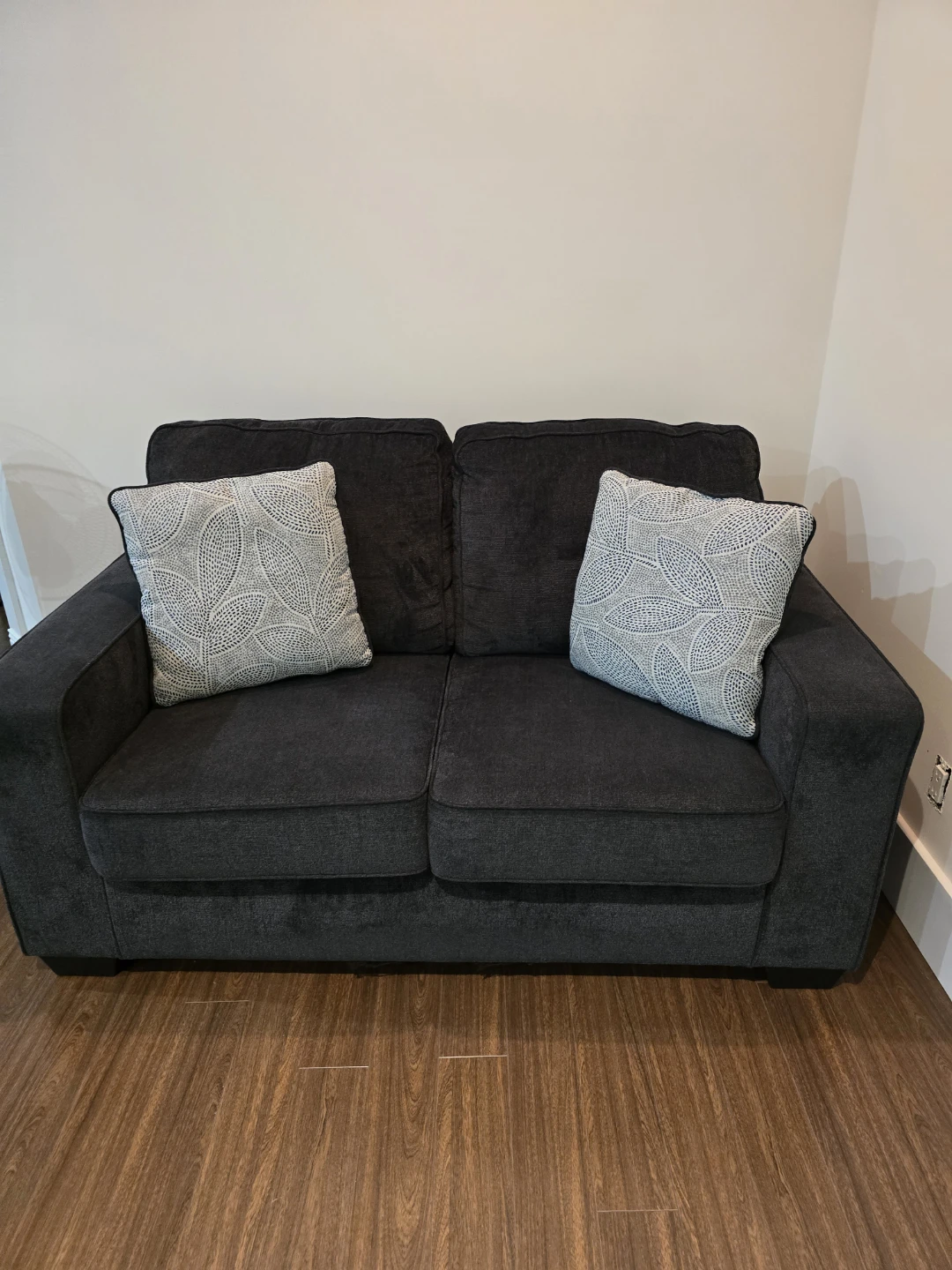 Dark Grey Sofa with Accent Pillows