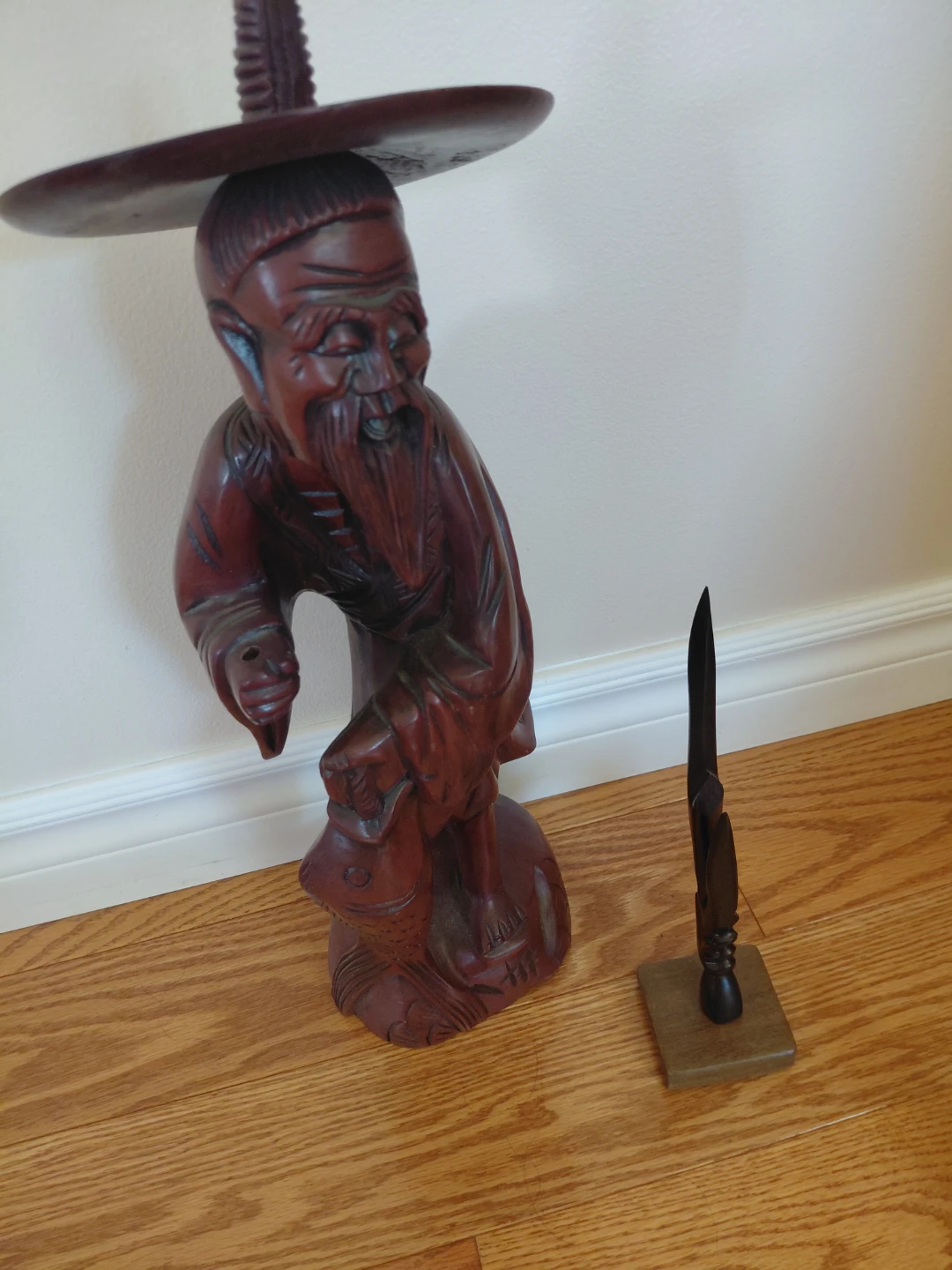 Wooden Figurine of an Old Man with a Hat