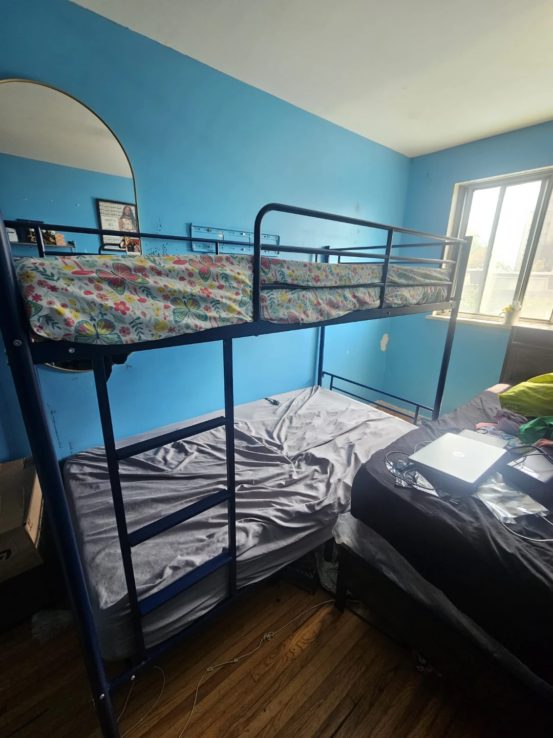 Black metal twin over twin bunk bed with mattress