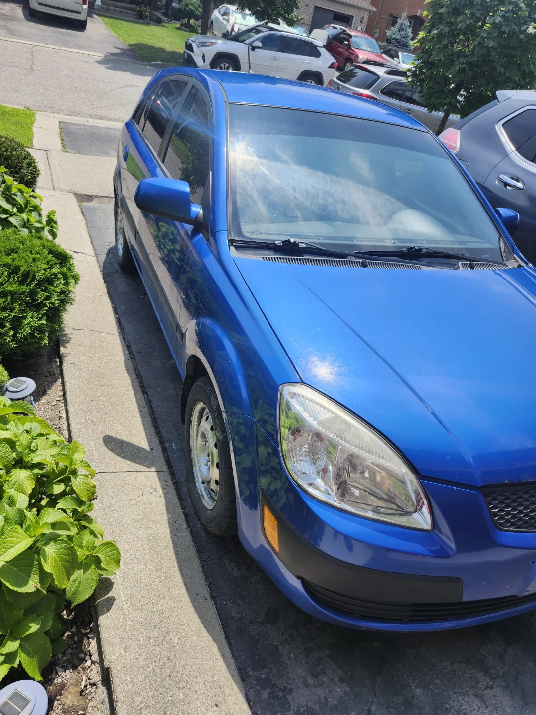 Blue Kia Rio Hatchback - photo 4
