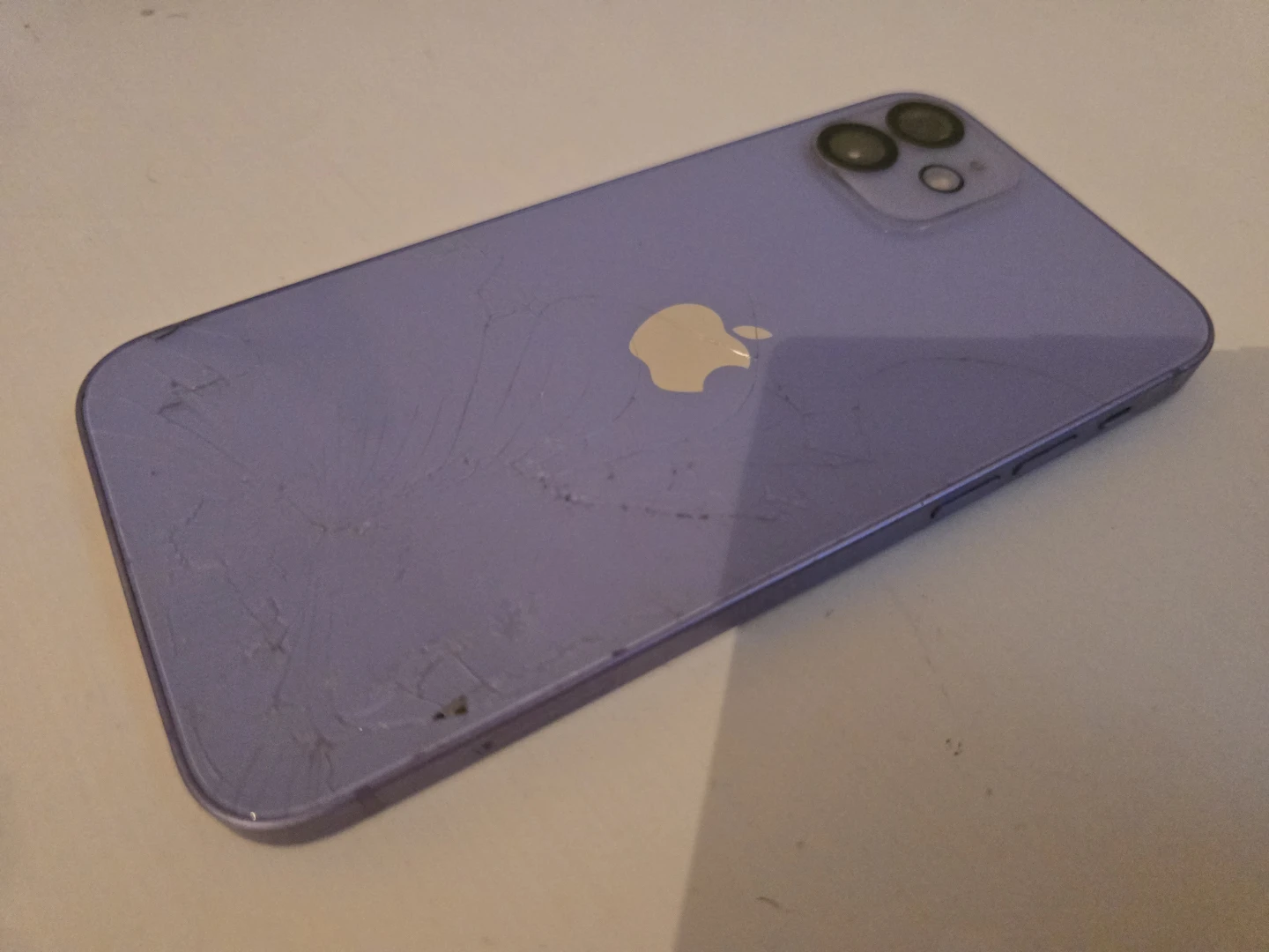 iPhone 12 Purple 64 GB - Cracked Back and camera, works great. - photo 2