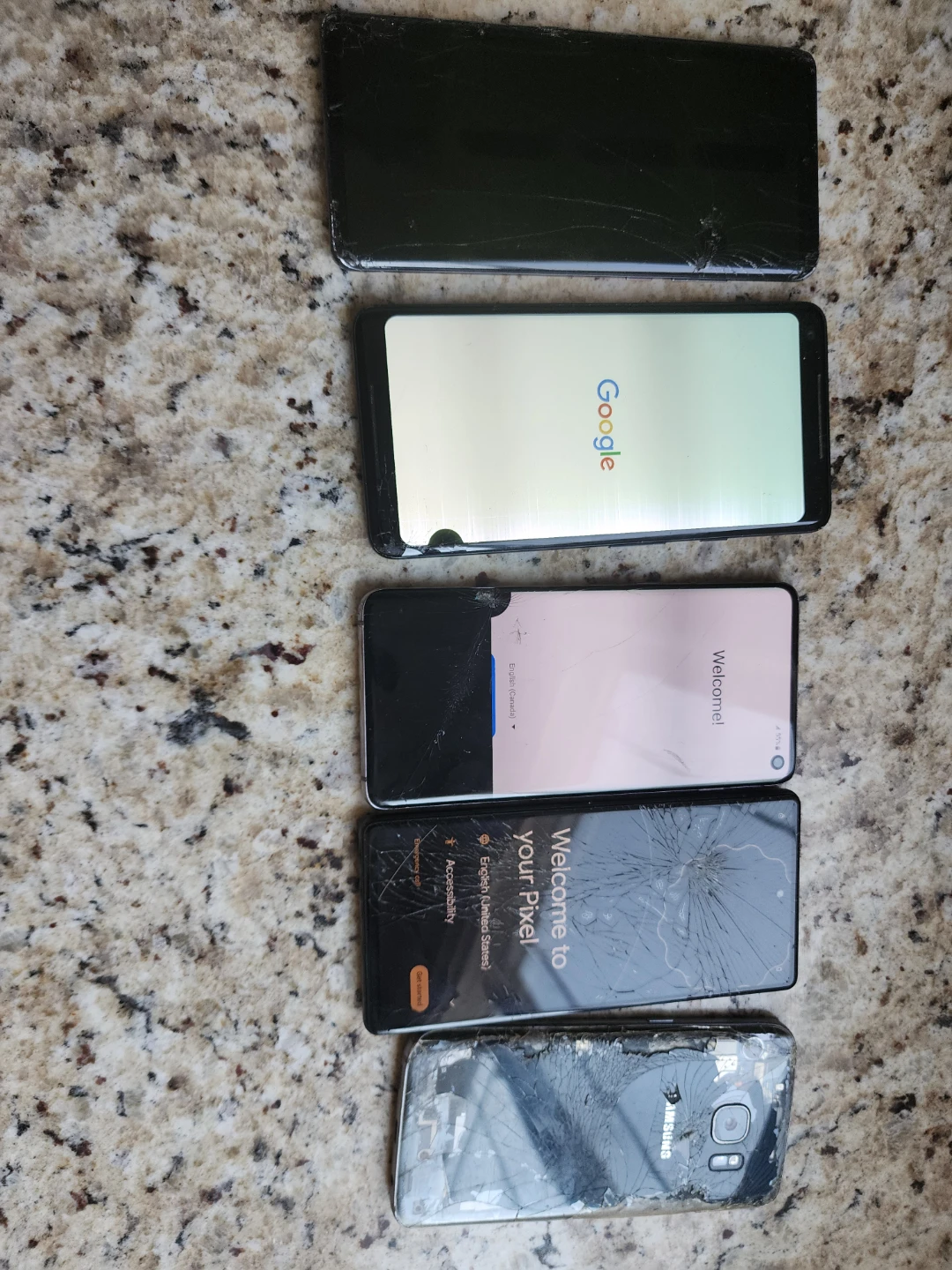 Lot of 6 Used Smartphones (Damaged Screens)