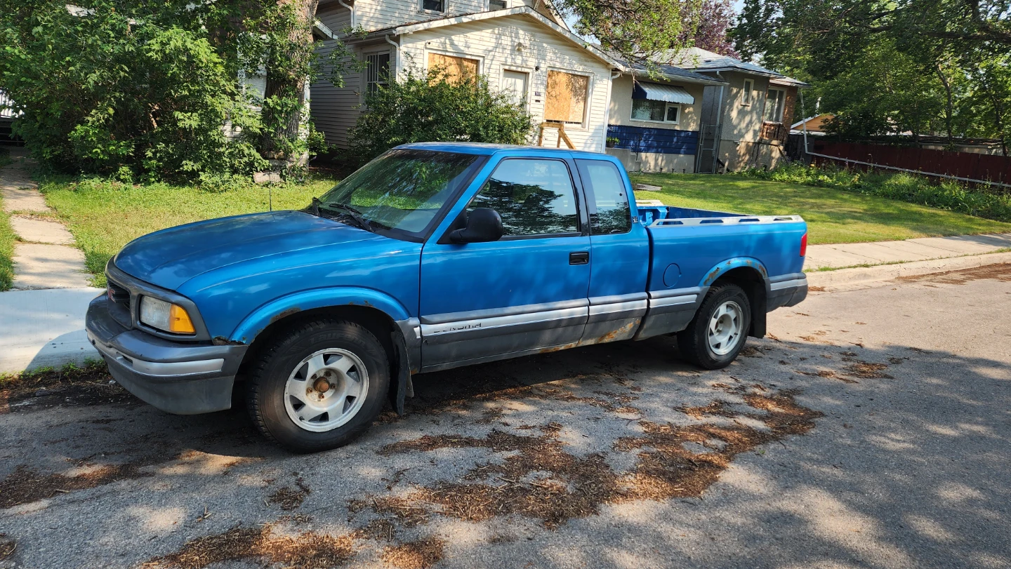 Blue GMC Pickup Truck