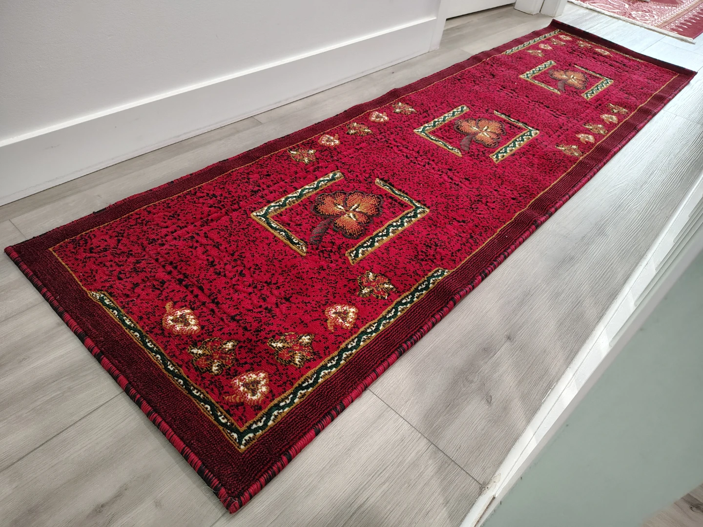 Beautiful Red Runner Rug with Floral Pattern. Like New.