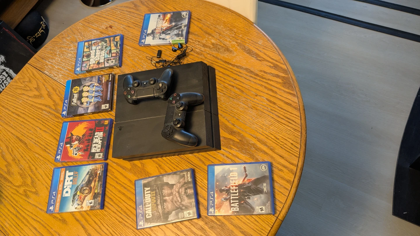Sony PlayStation 4 Console with 7 Games and 2 Controllers - photo 2