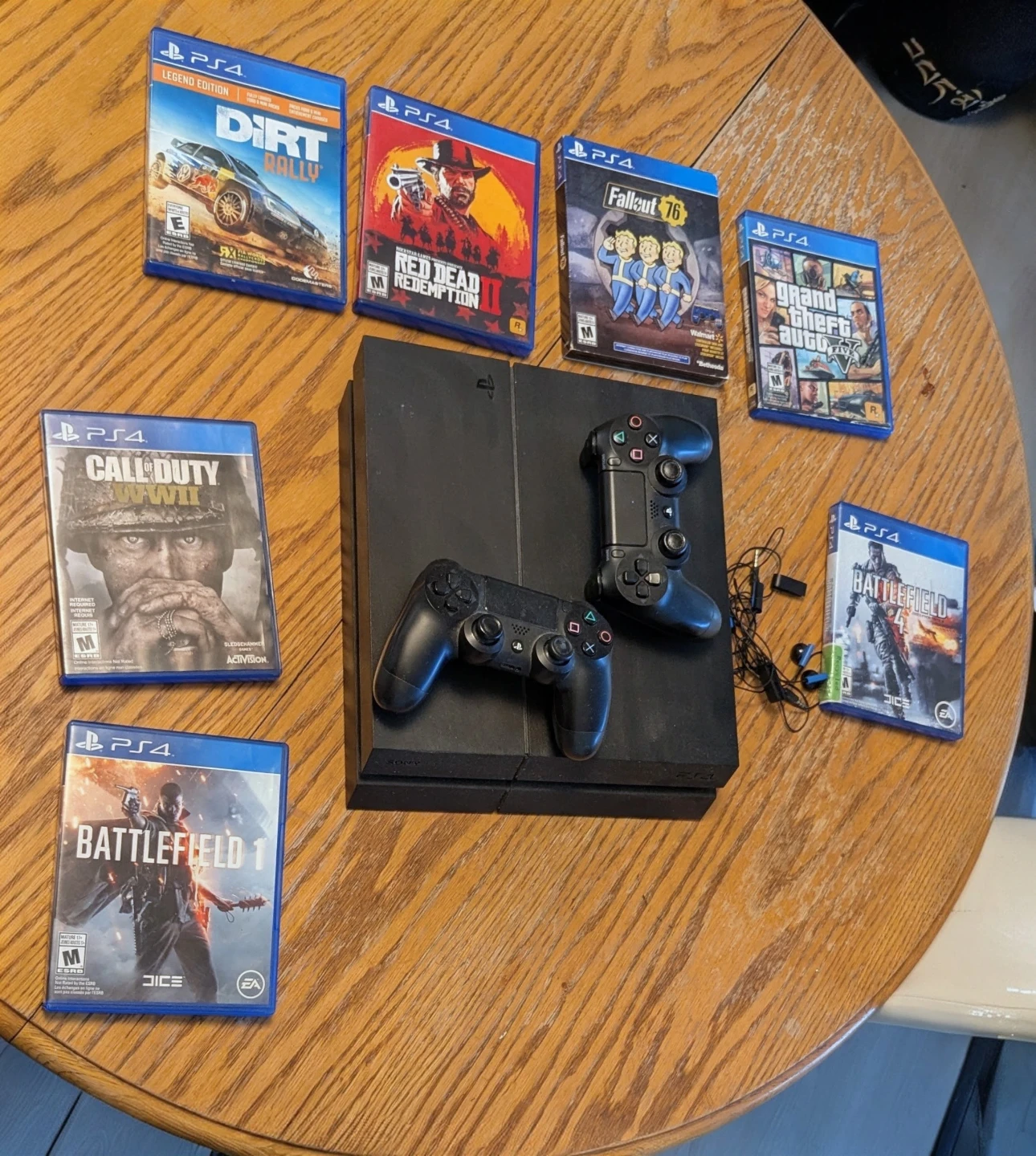 Sony PlayStation 4 Console with 7 Games and 2 Controllers