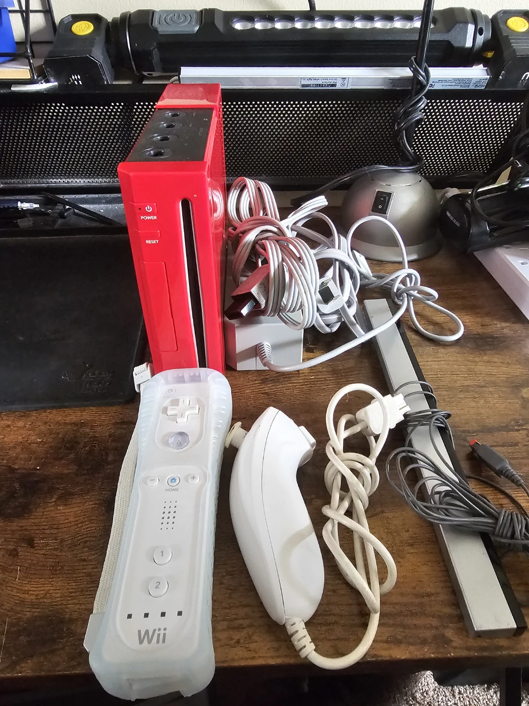Red Nintendo Wii Console with Controllers