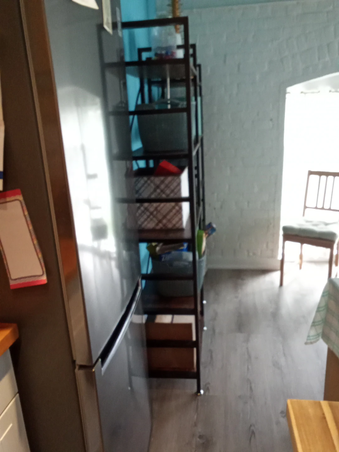 Tall metal bookshelf with wooden shelves - photo 2