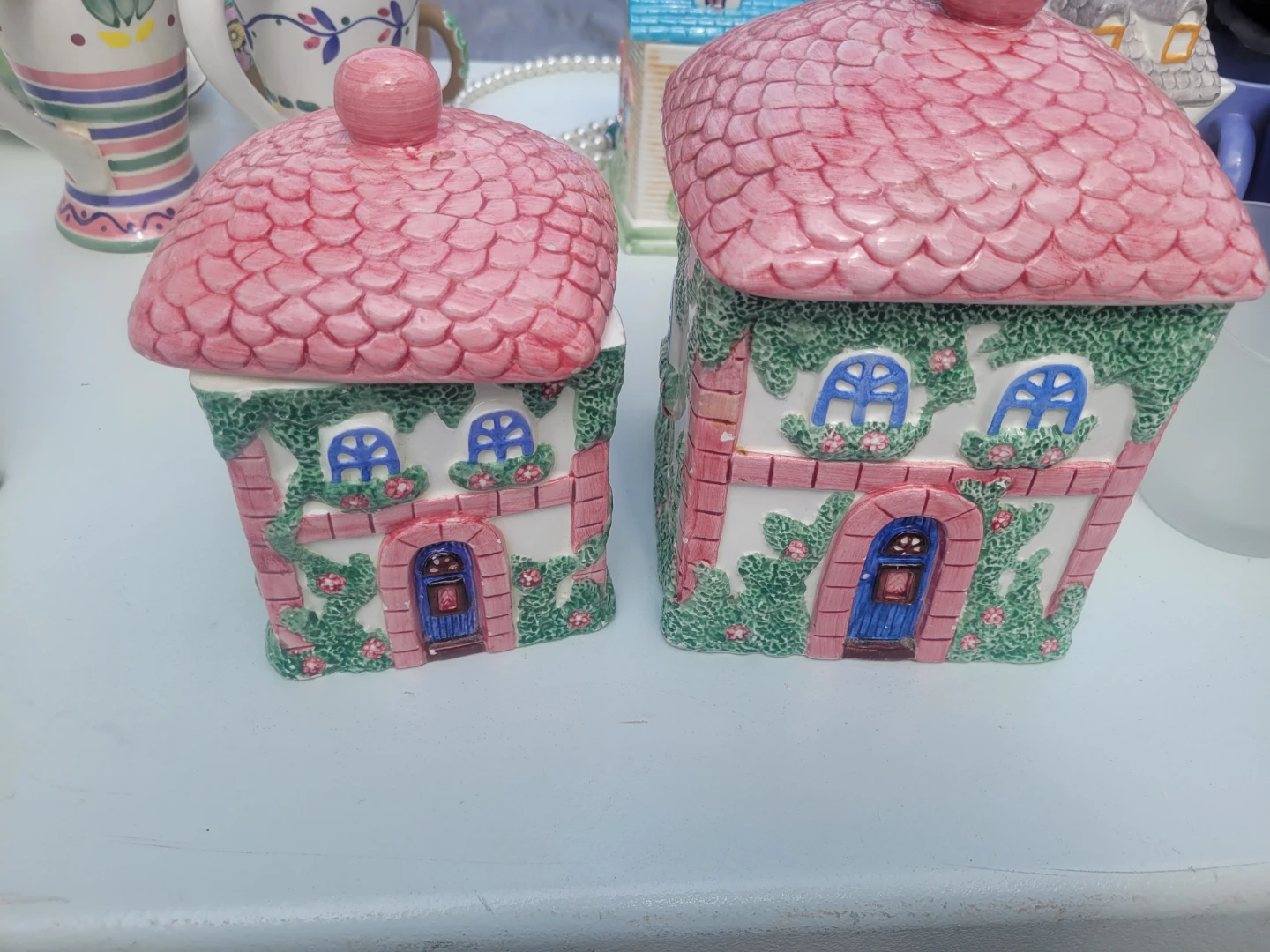 Avon ceramic house tea containers
