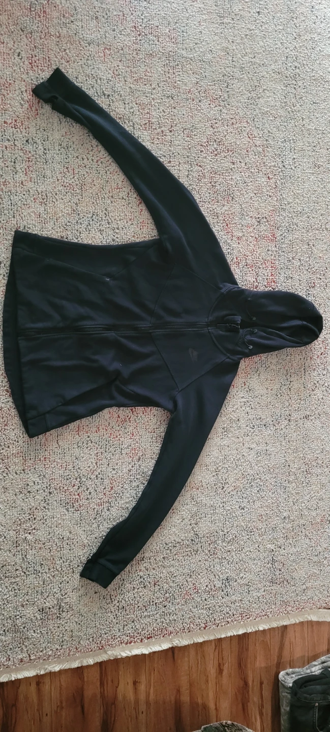 Women Nike Black zip up jacket.