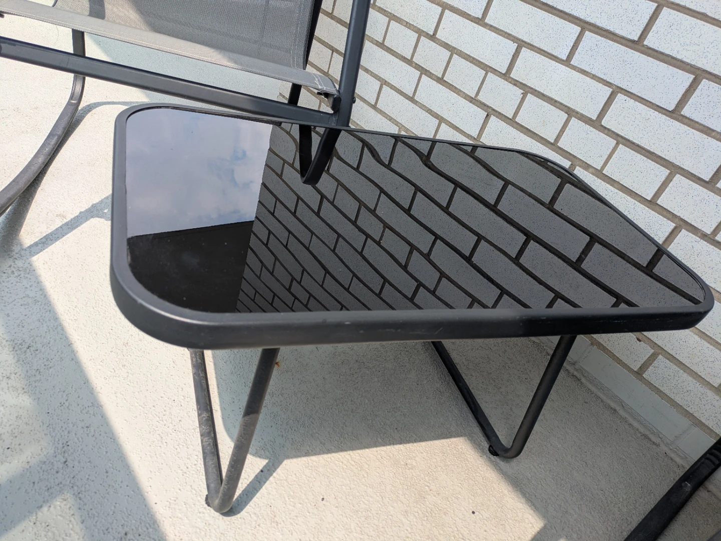 Like-New 4-Piece Patio Rocking Set with Glass Table - photo 2