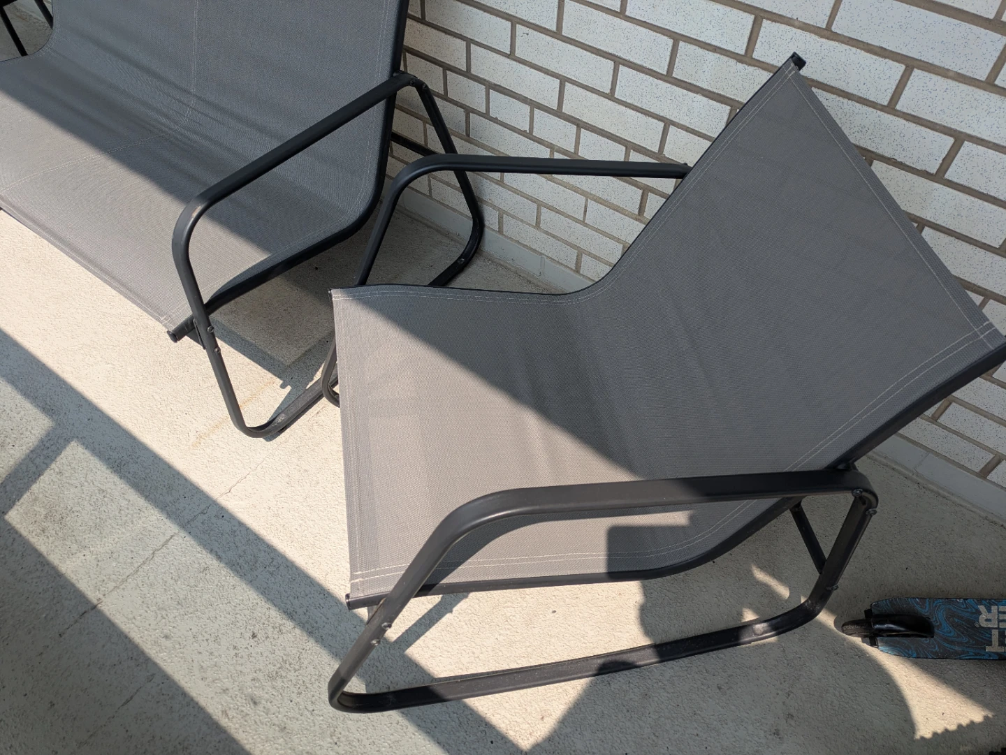 Like-New 4-Piece Patio Rocking Set with Glass Table - photo 4