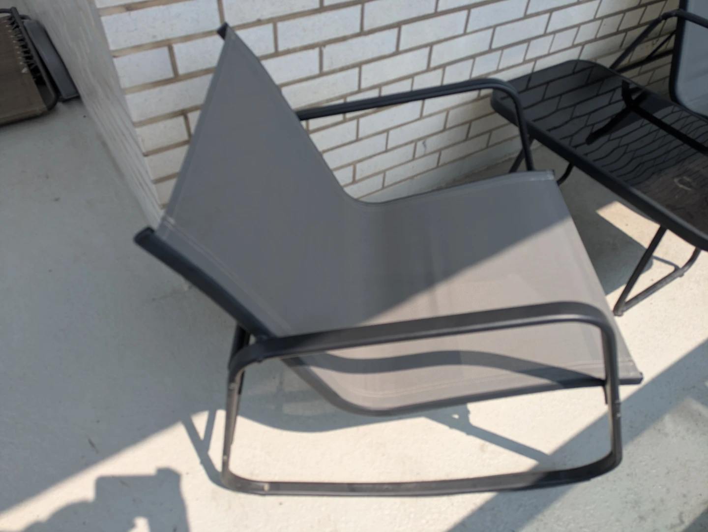 Like-New 4-Piece Patio Rocking Set with Glass Table - photo 5