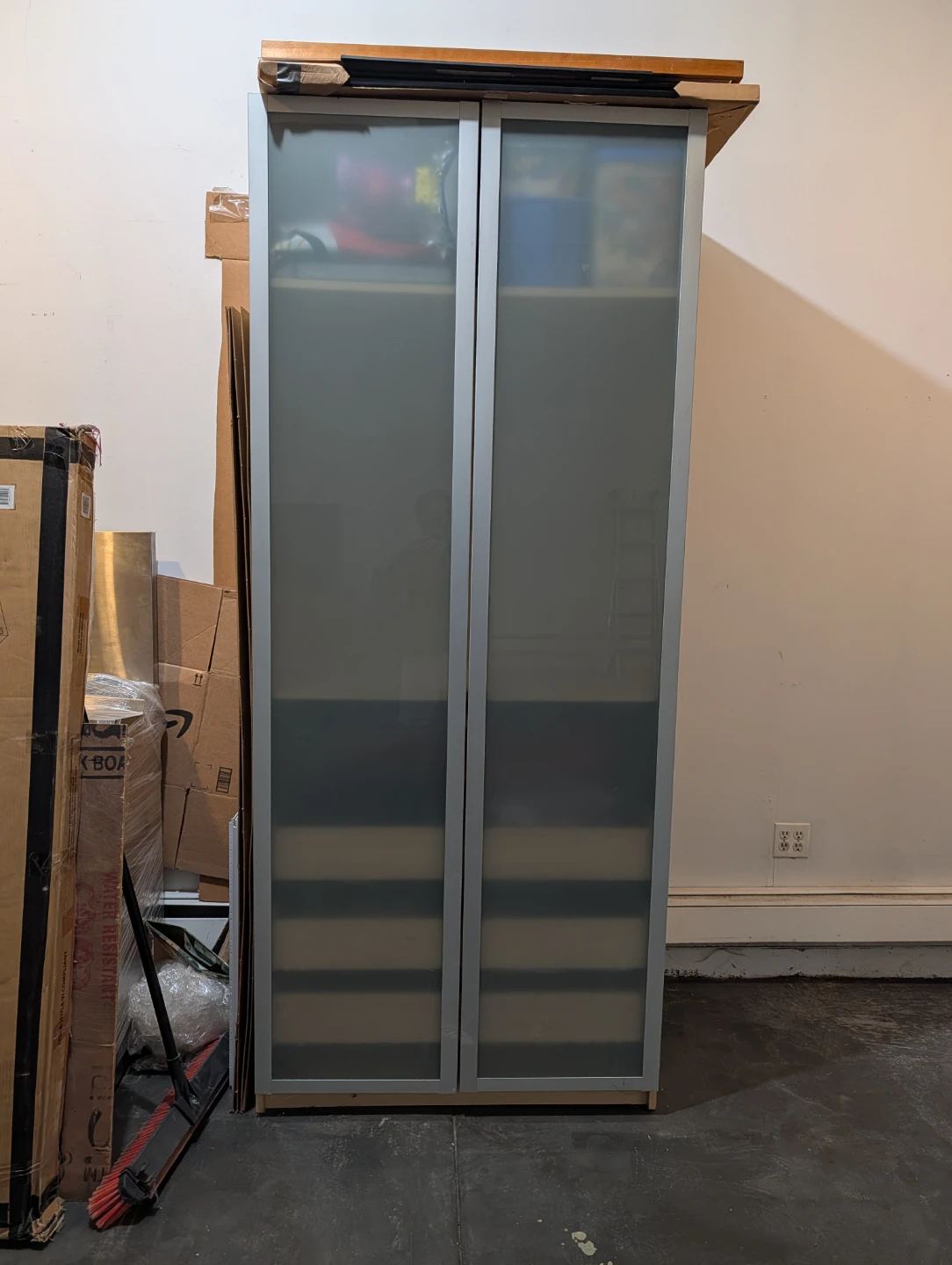 PAX wardrobe with frosted glass doors