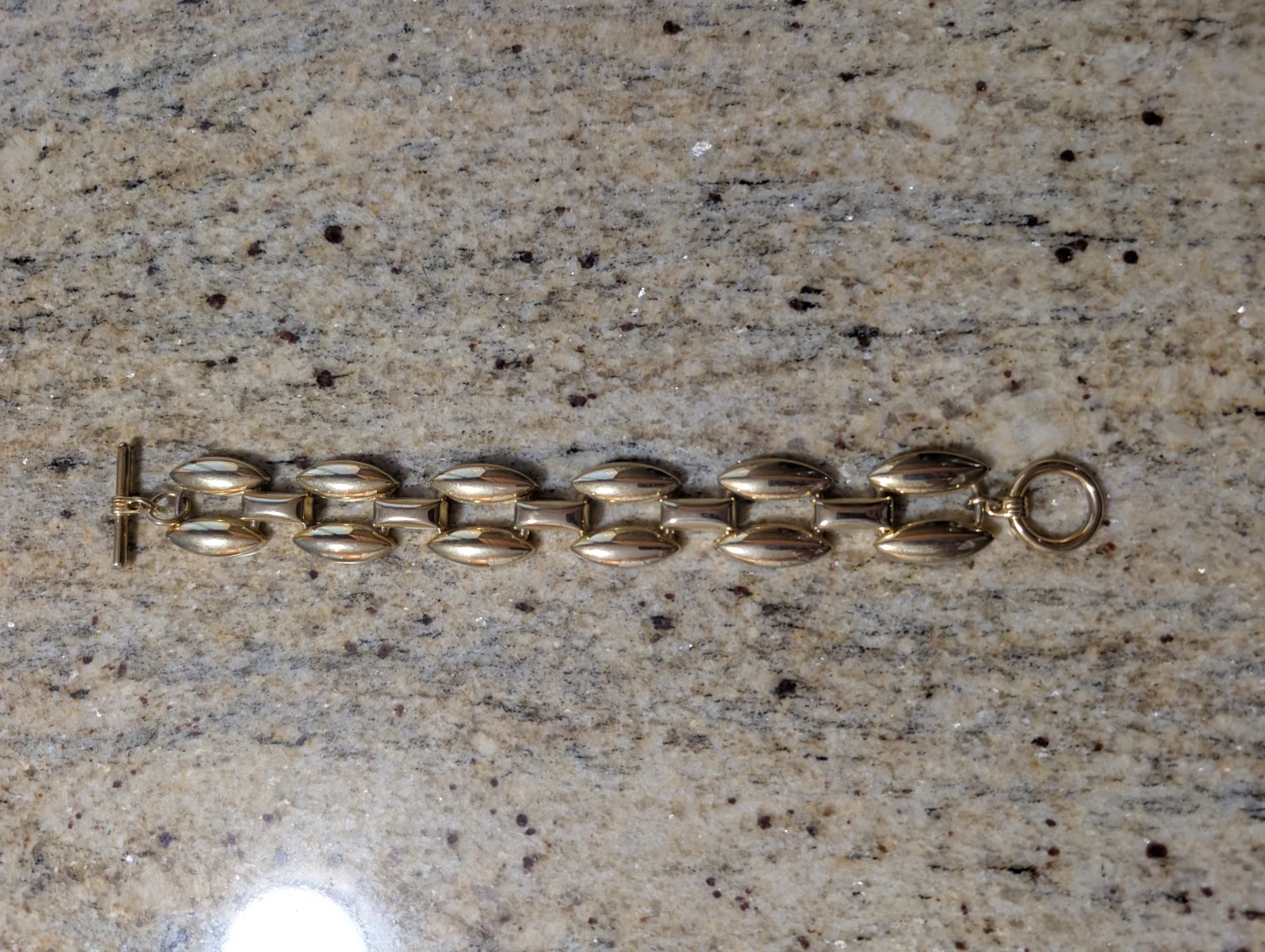 Gold link bracelet with toggle clasp
