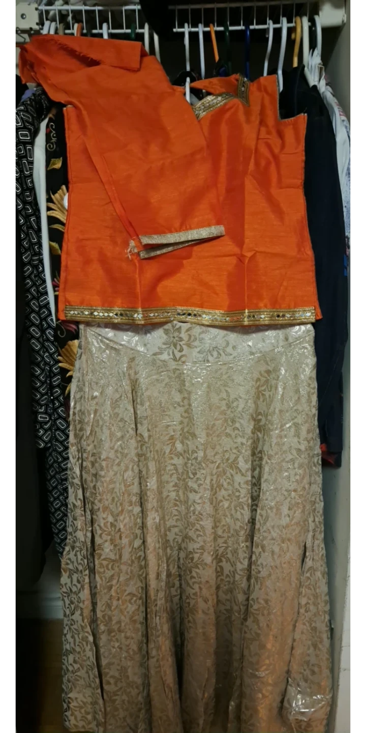 Orange Silk Blend Lehnga, Kurti  and golden net cape - photo 2
